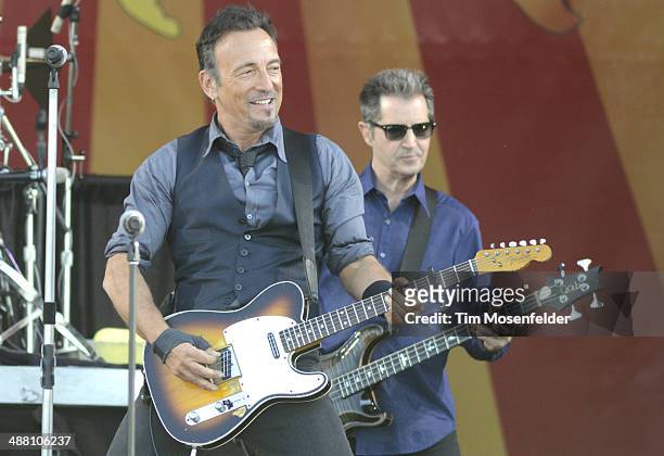 Bruce Springsteen and Garry Tallent of Bruce Spingsteen and the E Street Band perform during Day 6 of the 2014 New Orleans Jazz & Heritage Festival...
