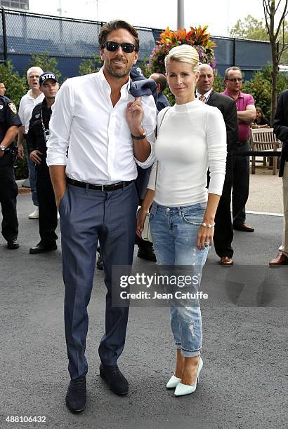 Henrik Lundqvist and his wife Therese Andersson arrive to attend the Men's Final on day fourteen of the 2015 US Open at USTA Billie Jean King...