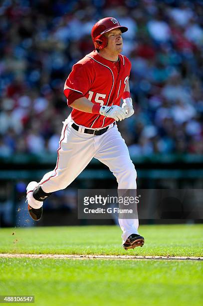 Nate McLouth of the Washington Nationals rounds the bases after hitting a home run in the eighth inning against the San Diego Padres at Nationals...