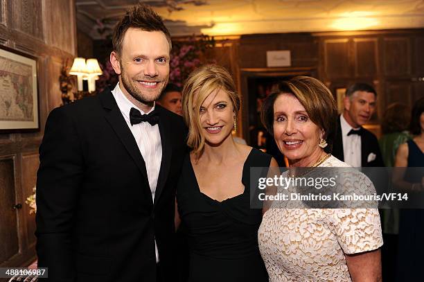 Joel McHale, Sarah Williams and Congresswoman Nancy Pelosi attend the Bloomberg & Vanity Fair cocktail reception following the 2014 WHCA Dinner at...