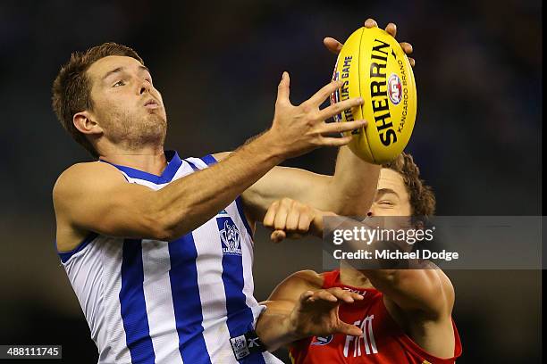 Luke McKenzie of the Kangaroos marks the ball during the round seven AFL match between the North Melbourne Kangaroos and the Gold Coast Suns at...