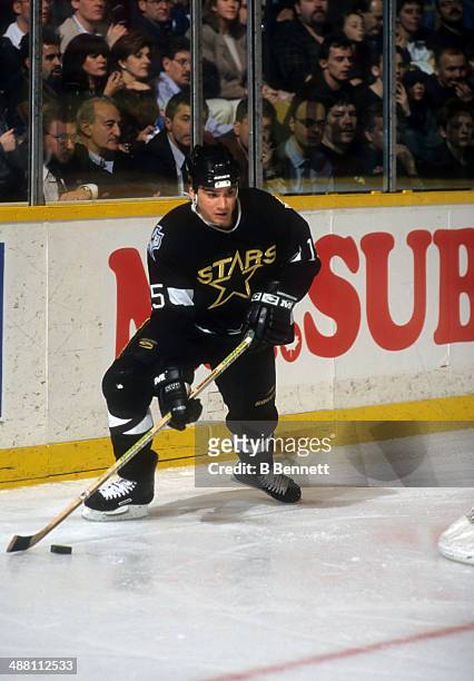 Jamie Langenbrunner of the Dallas Stars skates with the puck during an NHL game against the Toronto Maple Leafs on February 2, 1998 at the Maple Leaf...