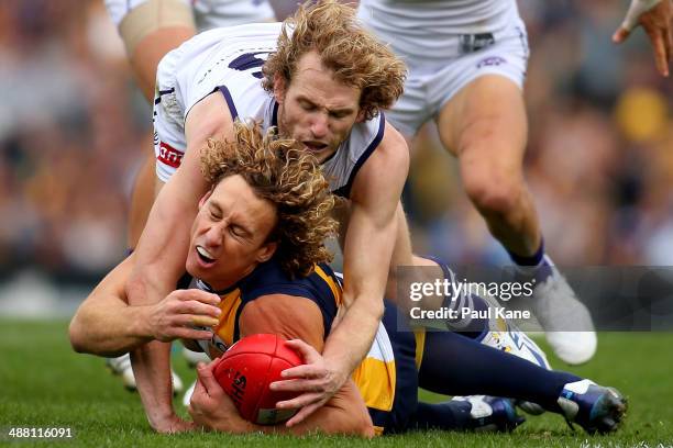 David Mundy of the Dockers tackles Matt Priddis of the Eagles during the round seven AFL match between the West Coast Eagles and the Fremantle...