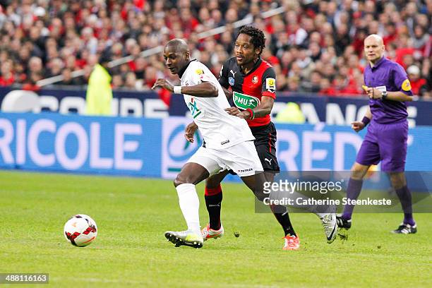 Younousse Sankhare of EA Guingamp tries to control the ball against Jean II Makoun of Stade Rennais FC during the French Cup Final match between...