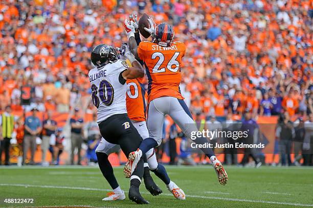 Defensive back Darian Stewart of the Denver Broncos makes a game-ending interception on a pass intended for tight end Crockett Gillmore of the...