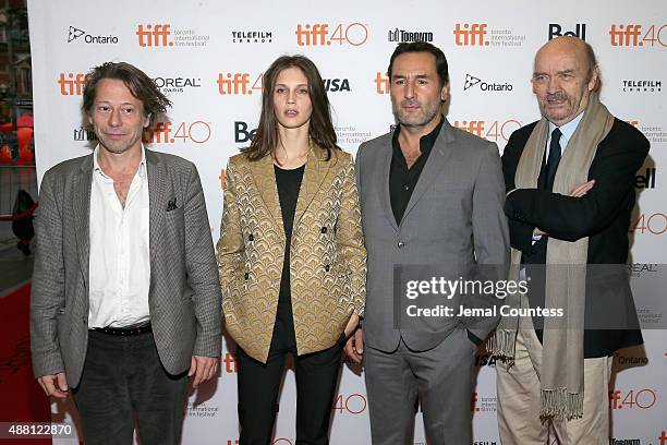 Actor Mathieu Amalric, Actress Marine Vacth, Director/Writer Jean-Paul Rappeneau and actor Gilles Lellouche attend the "Families" photo call during...
