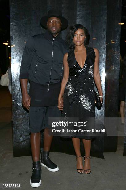 Actress Gabrielle Union and NBA player Dwyane Wade pose at Skylight at Moynihan Station during Spring 2016 New York Fashion Week: The Shows on...