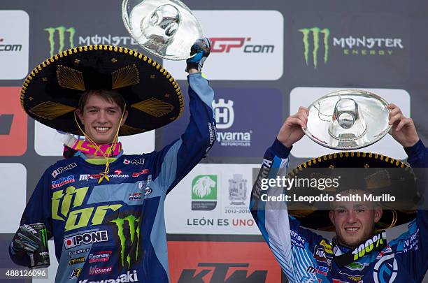 Thomas Covington of USA and Monster Energy Kawasaky Racing Team and Benoit Patures of France and Hemea Yamaha Yamalube celebrate after winning first...