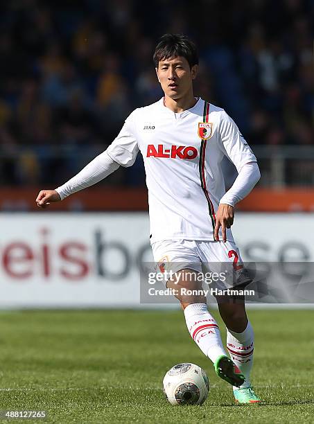 Dong-Won Ji of Augsburg runs with the ball during the Bundesliga match between Eintracht Braunschweig and FC Augsburg at Eintracht Stadion on May 3,...