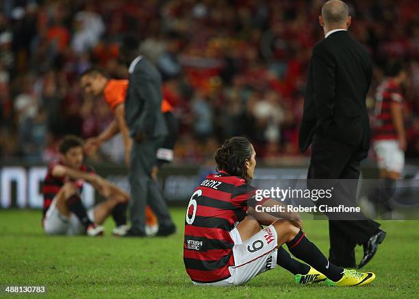 Jerome Polenz of the Wanderers looks dejected after the Wanderers were defeated by the Roar in extra time during the 2014 A-League Grand Final match...