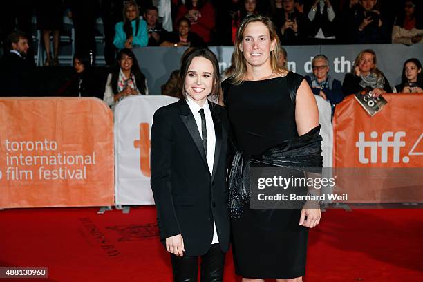 Ellen Page and Stacie Andree walk the red carpet at Roy Thomson Hall for the screening of Freehold, September 13, 2015.