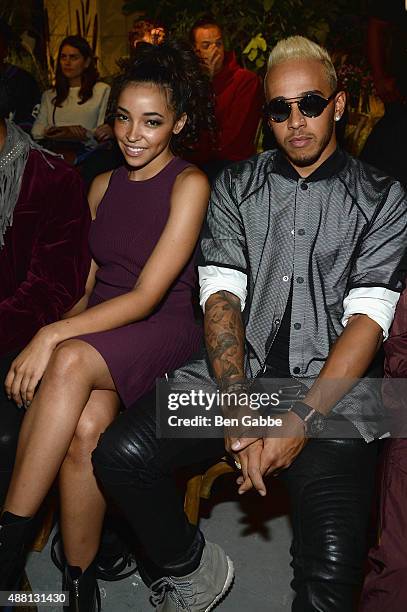 Singer Tinashe and Formula One driver Lewis Hamilton attend the Opening Ceremony Spring 2016 fashion show during New York Fashion Week at 25 Wall...