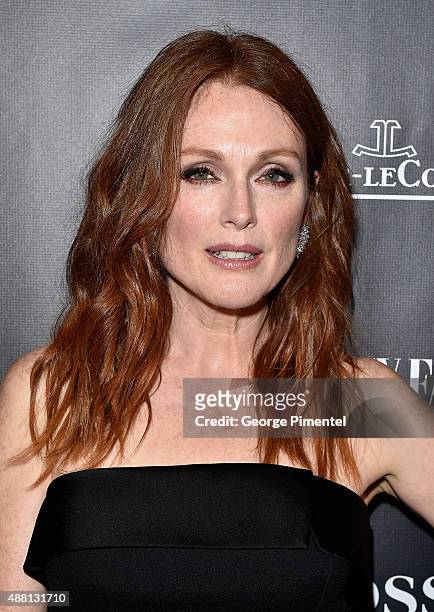 Actress Julianne Moore, dressed in BOSS bespoke heavy crepe tuxedo jumpsuit with satin trim, attends the Vanity Fair toast of "Freeheld" at TIFF 2015...