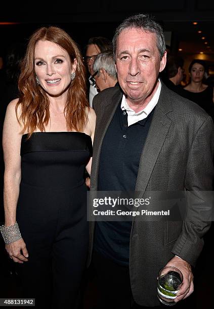 Actress Julianne Moore and Director Ivan Reitman attend the Vanity Fair toast of "Freeheld" at TIFF 2015 presented by Hugo Boss and supported by...