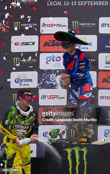 Romain Febvre of France and Yamaha Factory Racing Yamalube celebrates his first place with second place Sahun Simpson of Grand Britain and Hitachi...