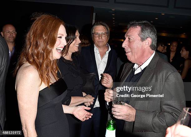 Actress Julianne Moore and Director Ivan Reitman attend the Vanity Fair toast of "Freeheld" at TIFF 2015 presented by Hugo Boss and supported by...