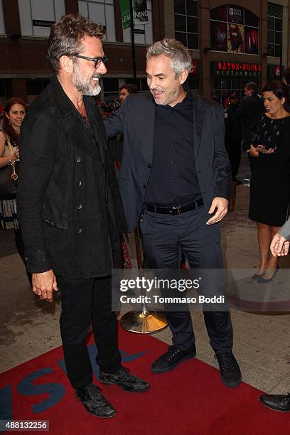 Actor Jeffrey Dean Morgan and director Alfonso Cuaron attend the "Desierto" premiere during the 2015 Toronto International Film Festival held at The...