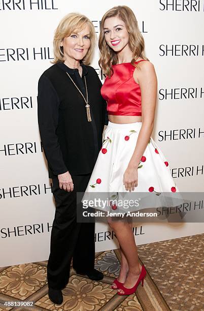 Sadie Robertson and designer Sherri Hill backstage at the Sherri Hill Spring 2016 fashion show during New York Fashion Week at The Plaza Hotel on...