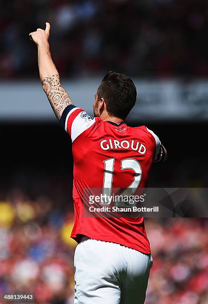 Olivier Giroud of Arsenal after scoring during the Barclays Premier League match between Arsenal and West Bromwich Albion at the Emirates Stadium on...