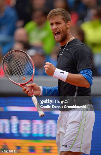 Martin Klizan of Slovakia celebrates winning the final against Fabio Fognini of Italy during the BMW Open on May 4, 2014 in Munich, Germany.
