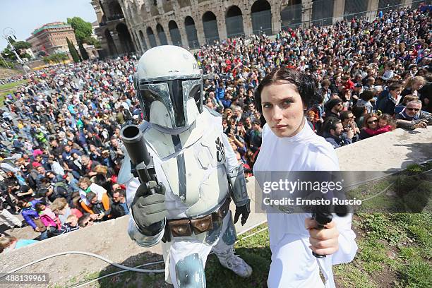 Star Wars fans dressed as a Clone Trooper and Princess Leila during the Star Wars Day 2014 at Colloseo on May 4, 2014 in Rome, Italy.