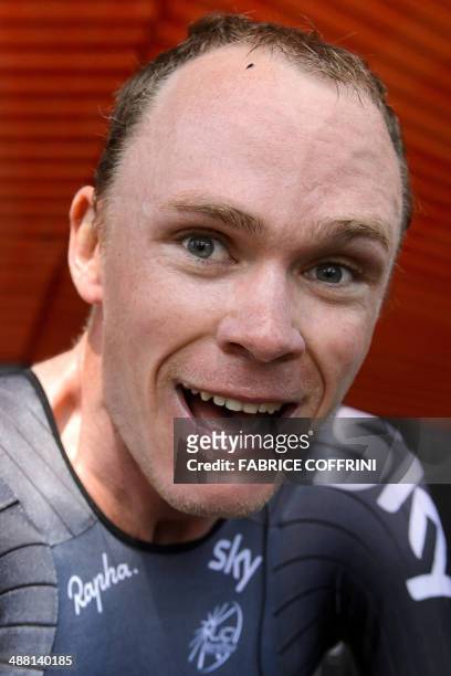 Winner of the Tour de Romandie cycling race, Britain's Christopher Froome, reacts after the final stage, a 18,5km individual time-trial around...