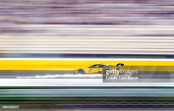 Timo Glock of Germany and BMW Team MTEK drives during the first round of the DTM 2014 German Touring Car Championship at Hockenheimring on May 4,...