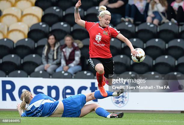 Louise Hutton of Cardiff City Ladies tackles Ellie Gilliatt of Sheffield FC Ladies during the FA Women's Premier League Cup Final between Cardiff...