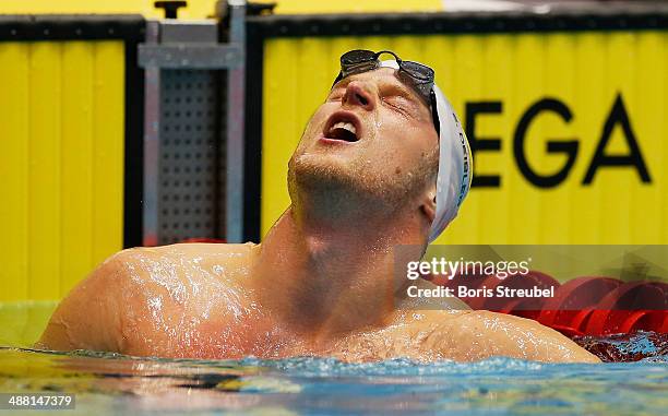 Steffen Deibler of Hamburger SC reacts after winning the men's 100 m butterfly A final during day three of the German Swimming Championship 2014 at...