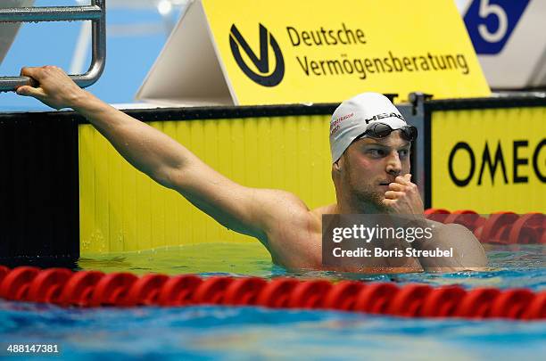 Steffen Deibler of Hamburger SC reacts after winning the men's 100 m butterfly A final during day three of the German Swimming Championship 2014 at...