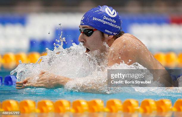Marco Koch of DSW 1912 Darmstadt competes in the men's 200 m breaststroke A final during day three of the German Swimming Championship 2014 at...