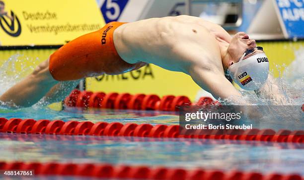 Christian Diener of PSV Cottbus 90 takes the start of the men's 100 m backstroke A final during day three of the German Swimming Championship 2014 at...