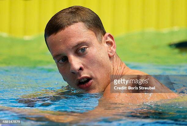 Jan-Philip Glania of SG Frankfurt looks on after winning the men's 100 m backstroke A final during day three of the German Swimming Championship 2014...