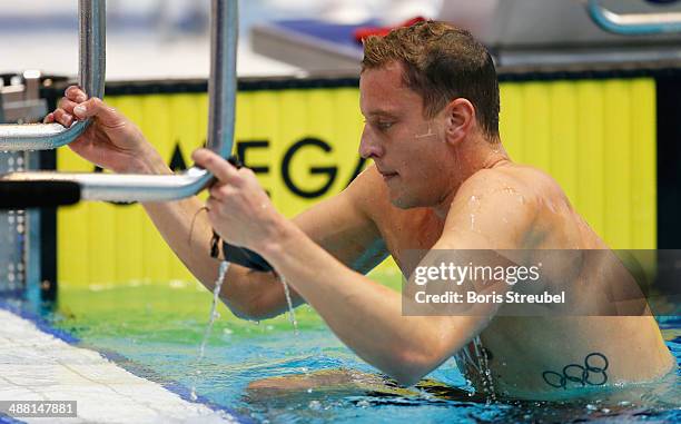 Jan-Philip Glania of SG Frankfurt looks on after winning the men's 100 m backstroke A final during day three of the German Swimming Championship 2014...