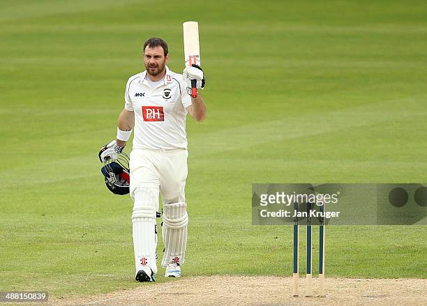 Michael Yardy of Sussex celebrates his century during the LV County Championship match between Lancashire and Sussex at Old Trafford on May 4, 2014...