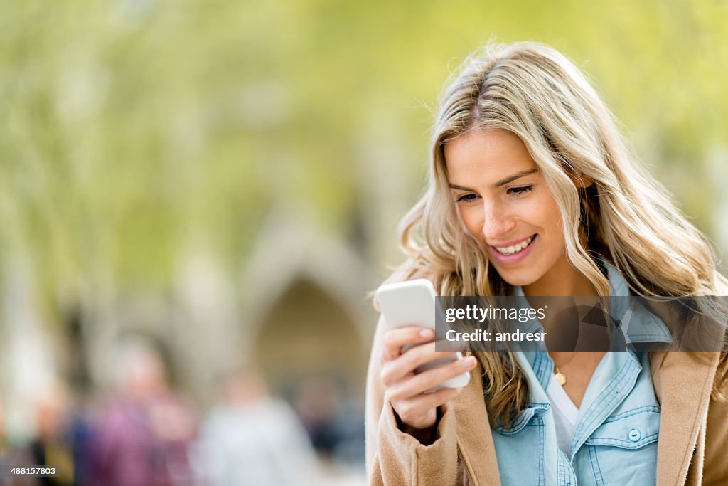 Woman texting on the phone