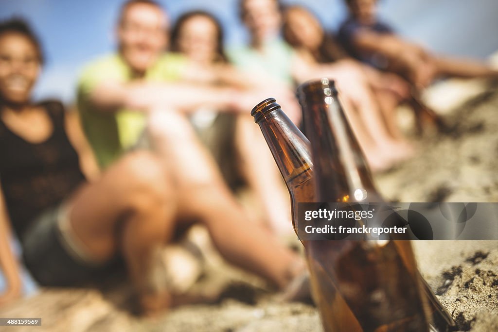 Friends togetherness at beach have fun with beer