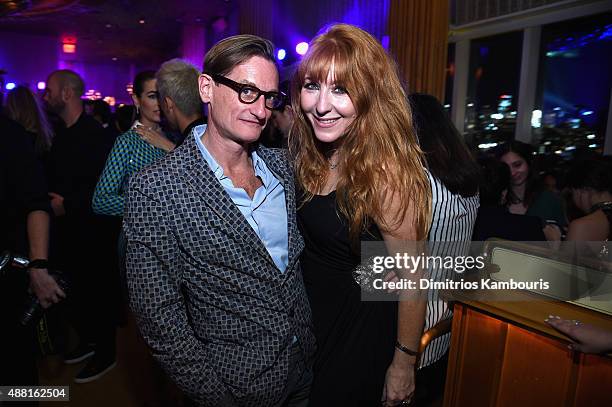 Hamish Bowles and Charlotte Tilbury attend the new Gold Collection fragrance launch hosted by Michael Kors featuring Duran Duran at Top of The...