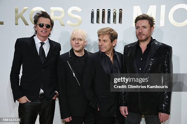 Members of Duran Duran John Taylor, Simon Le Bon, Nick Rhodes, and Roger Taylor attend the new Gold Collection fragrance launch hosted by Michael...