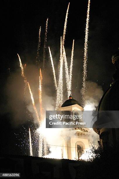 The Bell Tower of the Marian Shrine surrounded by fireworks with many colors. The simulated "Incendio del Campanile" of the Marian Shrine is a high...