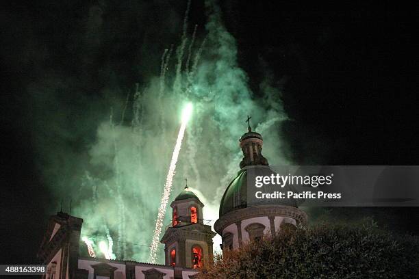 The Bell Tower of the Marian Shrine surrounded by fireworks with many colors. The simulated "Incendio del Campanile" of the Marian Shrine is a high...