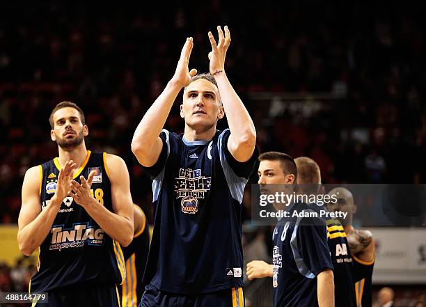 Sven Schultze of ALBA Berlin thanks the fans after victory in the basketball match between Bayern Muenchen and ALBA Berlin at Audi-Dome on May 4,...