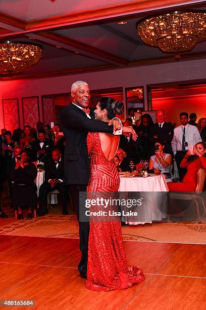 Julius and Dorys Erving dance at The Julius Erving "Black Tie" Ball Event at The Rittenhouse Hotel on September 13, 2015 in Philadelphia,...