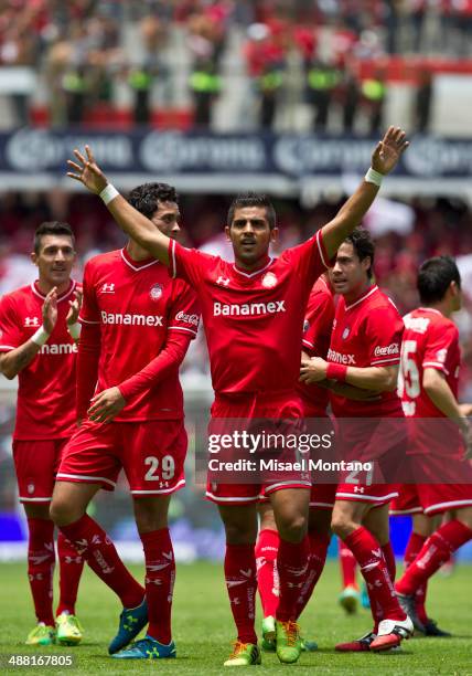 Miguel Angel Ponce of Toluca celebrates with his teammates after scoring the second goal against Xolos de Tijuana during the Quarterfinal second leg...