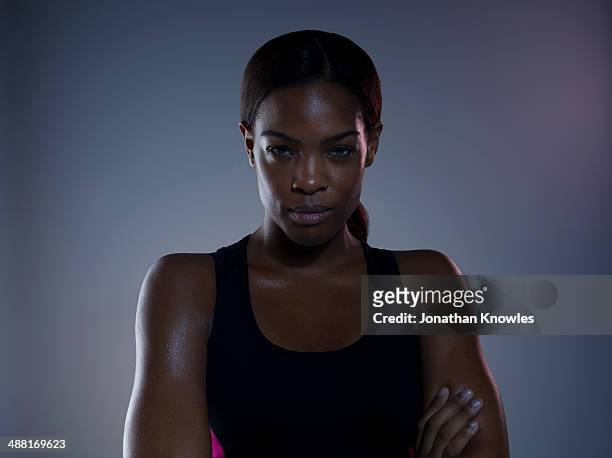 portrait of a dark skinned female, post workout - femminilità foto e immagini stock