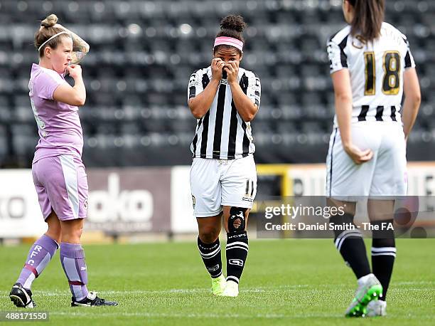 Desiree Scott of Notts Ladies County FC wipes her face over after being hit in the face with the ball during the FA WSL Continental Tyres Cup Quarter...