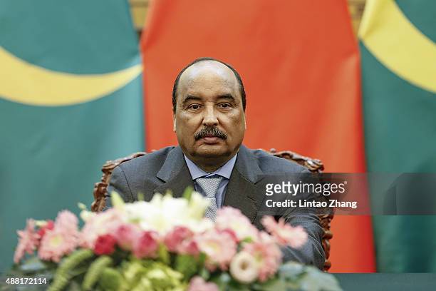 Mauritania's President Mohamed Ould Abdel Aziz attends the signing ceremony at the Great Hall of the People on September 14, 2015 in Beijing, China....