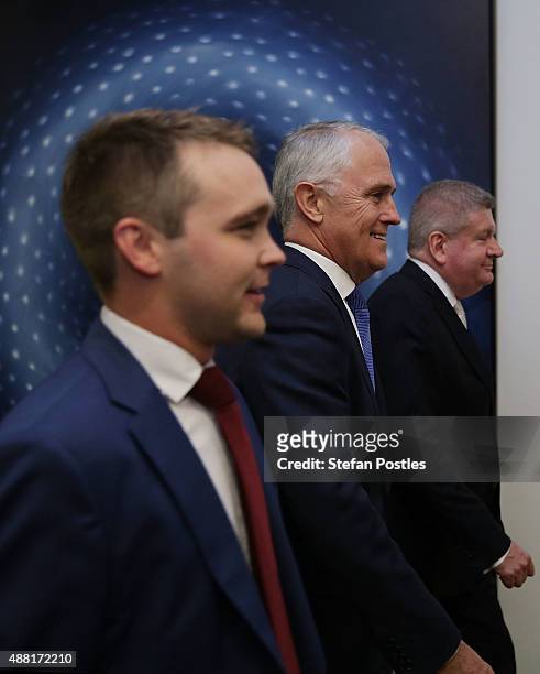 Malcolm Turnbull and supporters arrive at the Liberal party room for the leadership ballot at Parliament House on September 14, 2015 in Canberra,...