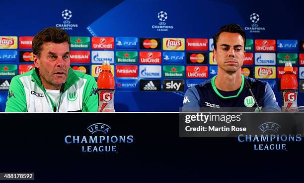 Dieter Hecking , head coach of Wolfsburg and goalkeeper Diego Benaglio attend the press conference ahead of the UEFA Champions League group B match...