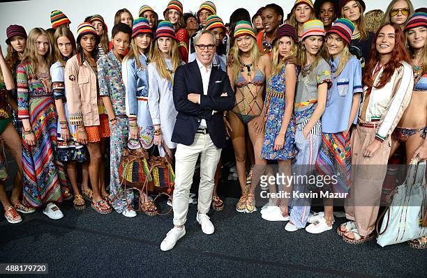 Tommy Hilfiger and models pose backstage at Tommy Hilfiger Women's Spring 2016 during New York Fashion Week: The Shows at Pier 36 on September 14,...